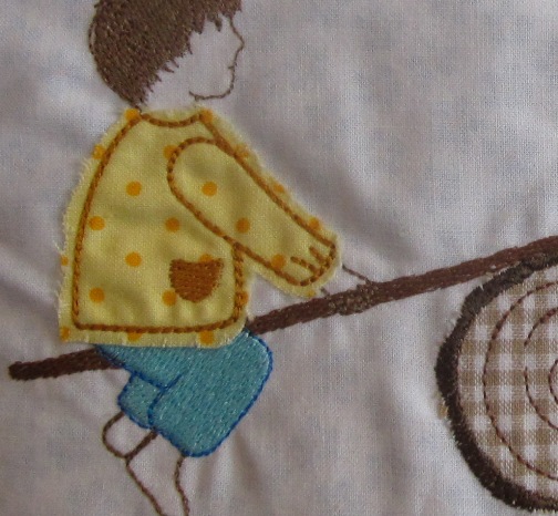 embroidery design children on seesaw